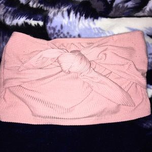 a light pink tube top